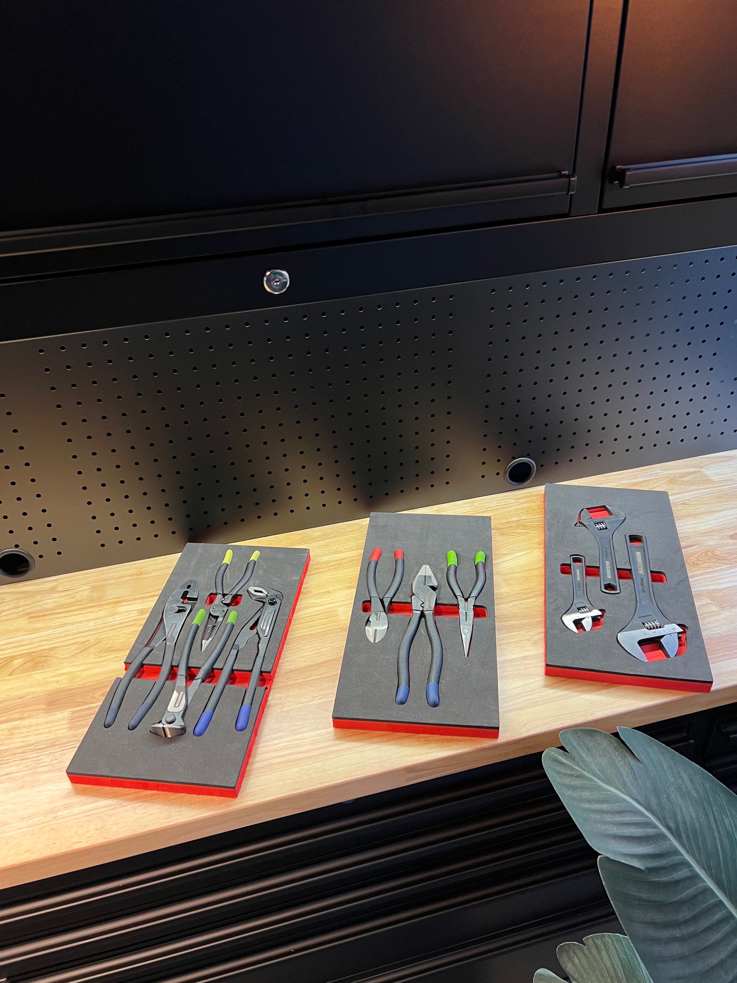 Set of tools in foam trays on tool box
