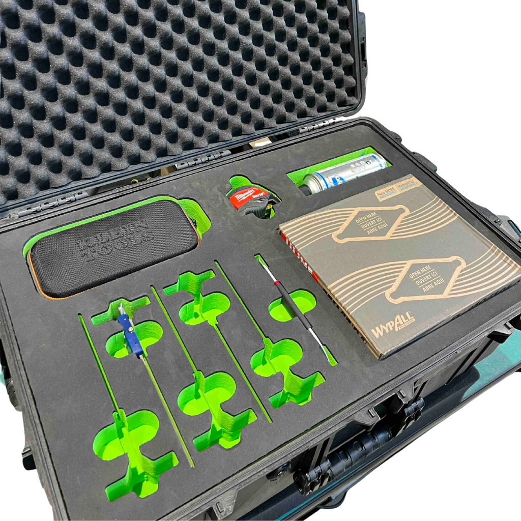 Open tool case with black & Green EVA Foam & tools inside